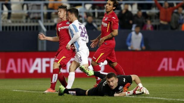 Juanpi slotting home Malaga's first goal. | Photo: La Liga