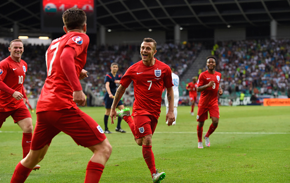 Wilshere (pictured, centre) has been a key figure for both club and country in midfield when fit | Photo: Getty