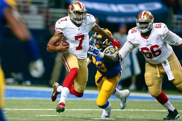 Kaepernick's terrific running ability should open up Kelly's offense and make it even more potent. (Dilip Vishwanat/Getty Images)