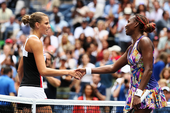 Pliskova and Williams shake hands at the net (Photo by Al Bello / Getty Images)