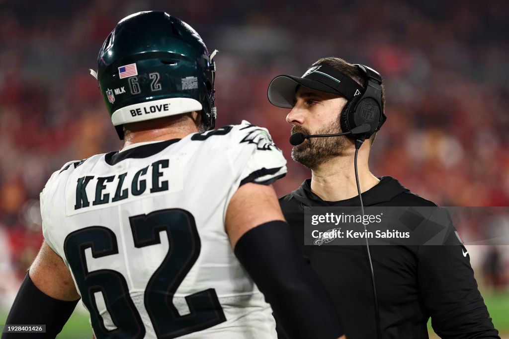 Jason Kelce #62 of the Philadelphia Eagles talks with head coach Nick Sirianni during the fourth quarter of an NFL wild-card playoff football game against the Tampa Bay Buccaneers at Raymond James Stadium on January 15, 2024 in Tampa, Florida. (Photo by Kevin Sabitus/Getty Images)