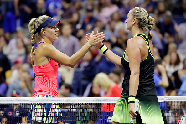 Kerber and Keys shake hands at the net following their fourth round match (Photo by Andy Lyons / Getty Images)