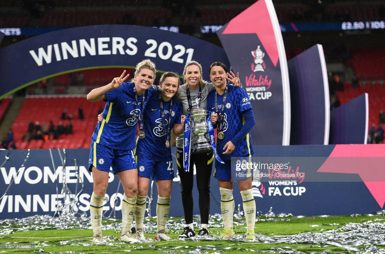 Millie Bright, Erin Cuthbert, Carly Telford and Sam Kerr of Chelsea lift the Vitality Women's FA Cup Trophy after their sides victory in the Vitality Women's FA Cup Final between Arsenal FC and Chelsea FC at Wembley Stadium in London, England. (Photo by Harriet Lander - Chelsea FC/Chelsea FC via Getty Images)