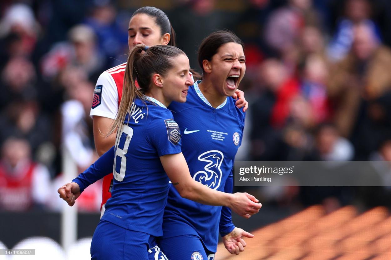 Sam Kerr of Chelsea celebrates with teammate Jelena Cankovic after scoring the team's first goal during the FA Women's Continental Tyres League Cup Final match between Chelsea and Arsenal at Selhurst Park on March 05, 2023 in London, England. (Photo by Alex Pantling/Getty Images)