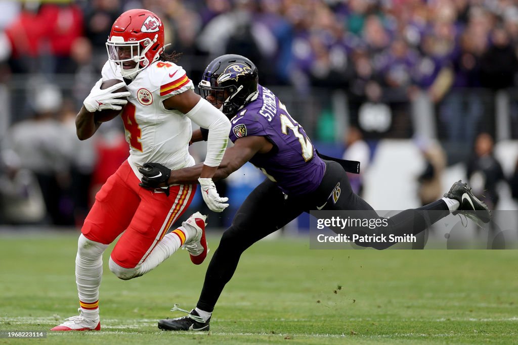 Rashee Rice #4 of the Kansas City Chiefs carries the ball against Brandon Stephens #21 of the Baltimore Ravens during the first quarter in the AFC Championship Game at M&T Bank Stadium on January 28, 2024 in Baltimore, Maryland. (Photo by Patrick Smith/Getty Images)