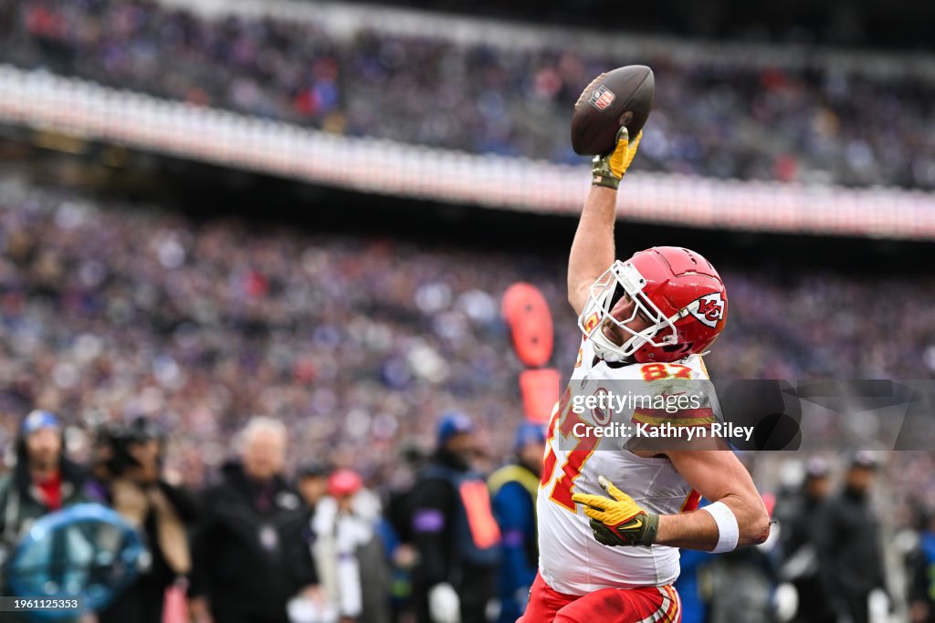 Travis Kelce #87 of the Kansas City Chiefs goes to spike the football after scoring a touchdown during the first half of the AFC Championship game against the Baltimore Ravens at M&T Bank Stadium on January 28, 2024 in Baltimore, Maryland. (Photo by Kathryn Riley/Getty Images)