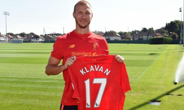 Klavan with the No.17 shirt he will wear for the club. (Picture: Liverpool FC via Getty Images)