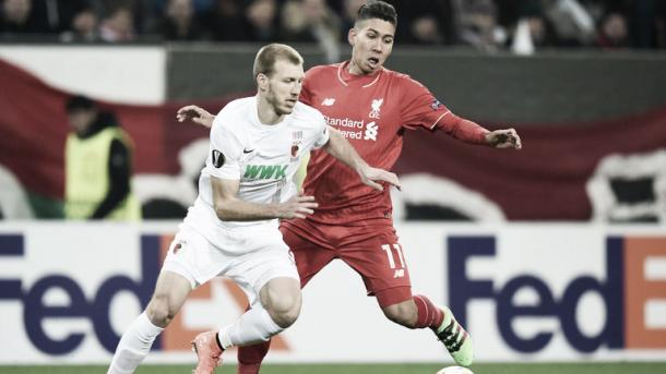 Klavan, pictured playing against Liverpool last season, will make his Reds debut today (photo; Getty)