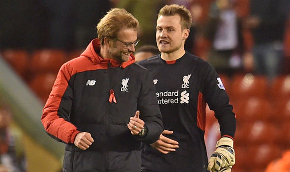 Klopp pictured with Simon Mignolet, who he has praised, despite reportedly wanting a new 'keeper (photo: LFC)