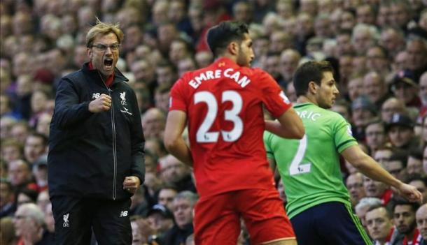 Klopp barks instructions at Can, who has greatly improved this season (photo: getty images)