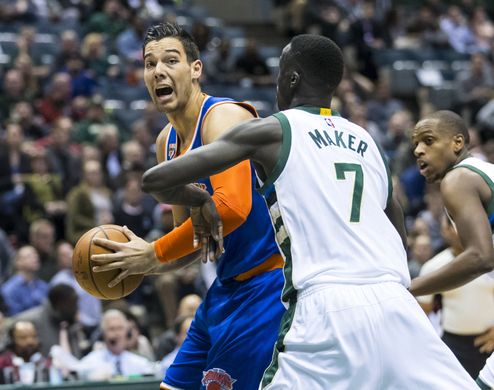 New York Knicks center Willy Hernangomez (14) holds the ball against Milwaukee Bucks forward Thon Maker (7). Photo By:Jeff Hanisch-USA TODAY Sports.  