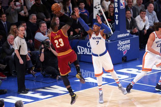 Cleveland Cavalier's forward LeBron James(23) attempts a shot over New York Knicks Forward Carmelo Anthony(7). Photo Courtesy of Brad Penner-USA TODAY Sports.  