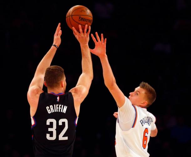 Los Angeles Clippers forward Blake Griffin (32) shoots over New York Knicks forward Kristaps Porzingis. Photo:Credit: Jim McIsaac/Newsday.