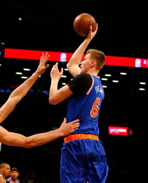 New York Knicks forward Kristaps Porzingis puts up a shot. Photo courtesy of  Jim McIsaac, Newsday.