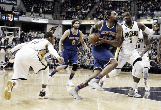 New York Knicks' Derrick Williams drives to the rim against Lavoy Allen. Brian Spurlock-USA TODAY Sports 