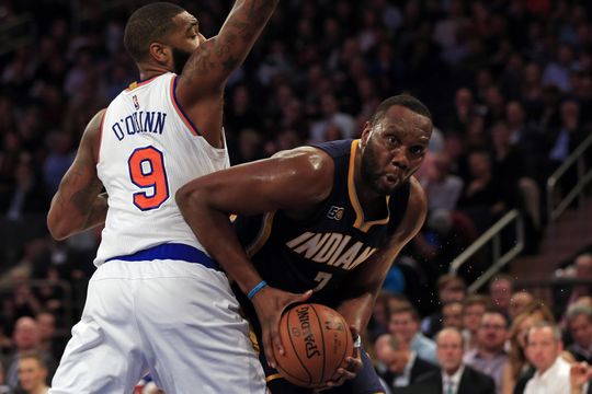 Indiana Pacers center Al Jefferson (7) drives to the rim past New York Knicks center Kyle O'Quinn. Photo Courtesy of  Adam Hunger-USA TODAY Sports.