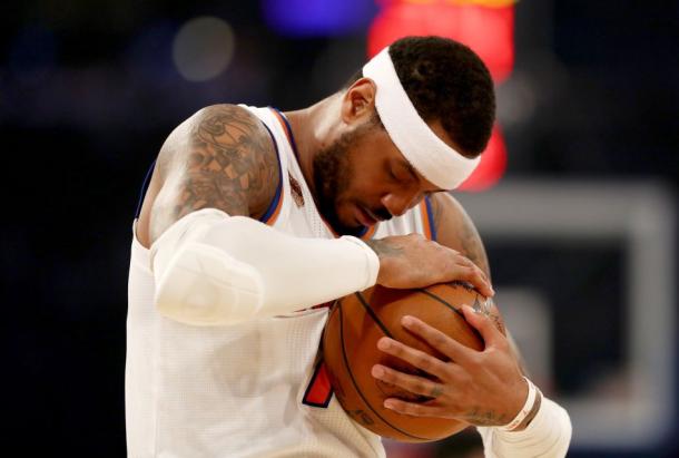 Carmelo Anthony doing his pre-game ritual before tip-off. Photo Courtesy: Getty Images / Elsa 