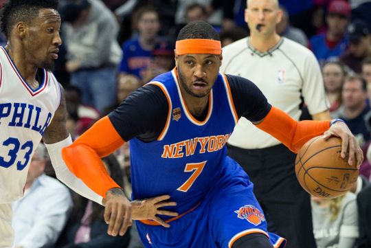 New York Knicks forward Carmelo Anthony (7) drives past Philadelphia Sixers forward Robert Covington (33).  Bill Streicher-USA TODAY Sports.