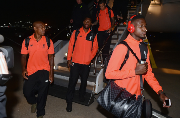 Liverpool players (L-R:) Wisdom, Coutinho, Sturridge and Origi depart a plane during their pre-season tour in America earlier this summer. | Photo: Getty