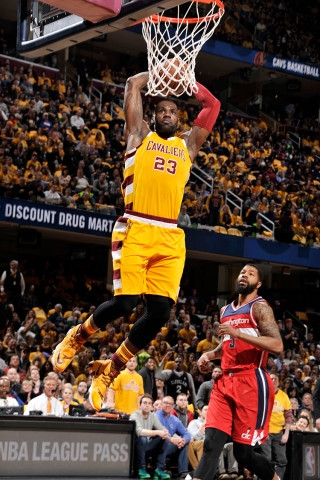 Lebron James goes an emphatic fast-break dunk. (David Liam Kyle/NBAE/Getty Images)