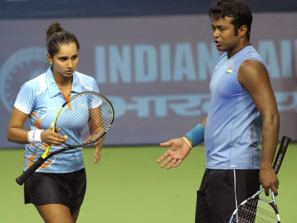 Sania Mirza and Leander Paes talk in-between points. | Photo: AFP