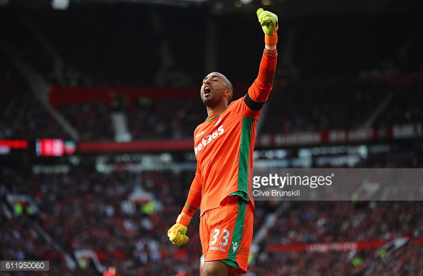 Lee Grant celebrates after the final whistle during the Premier League match between Manchester United and Stoke City at Old Trafford. | Photo: Clive Brunskill/Getty Images