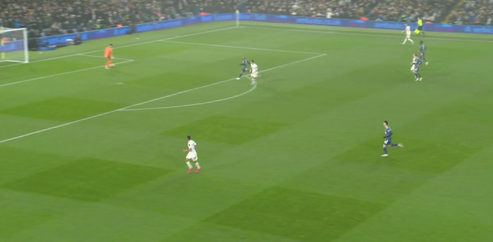 Alexandre Lacazette continued the press while Arsenal players mark Leeds’ supporting players, forcing a long ball to a marked player.
