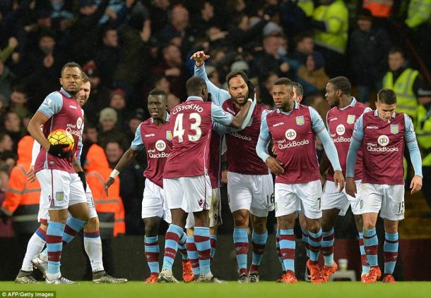 Lescott and his teammates celebrate the winning goal (photo: Getty Images)