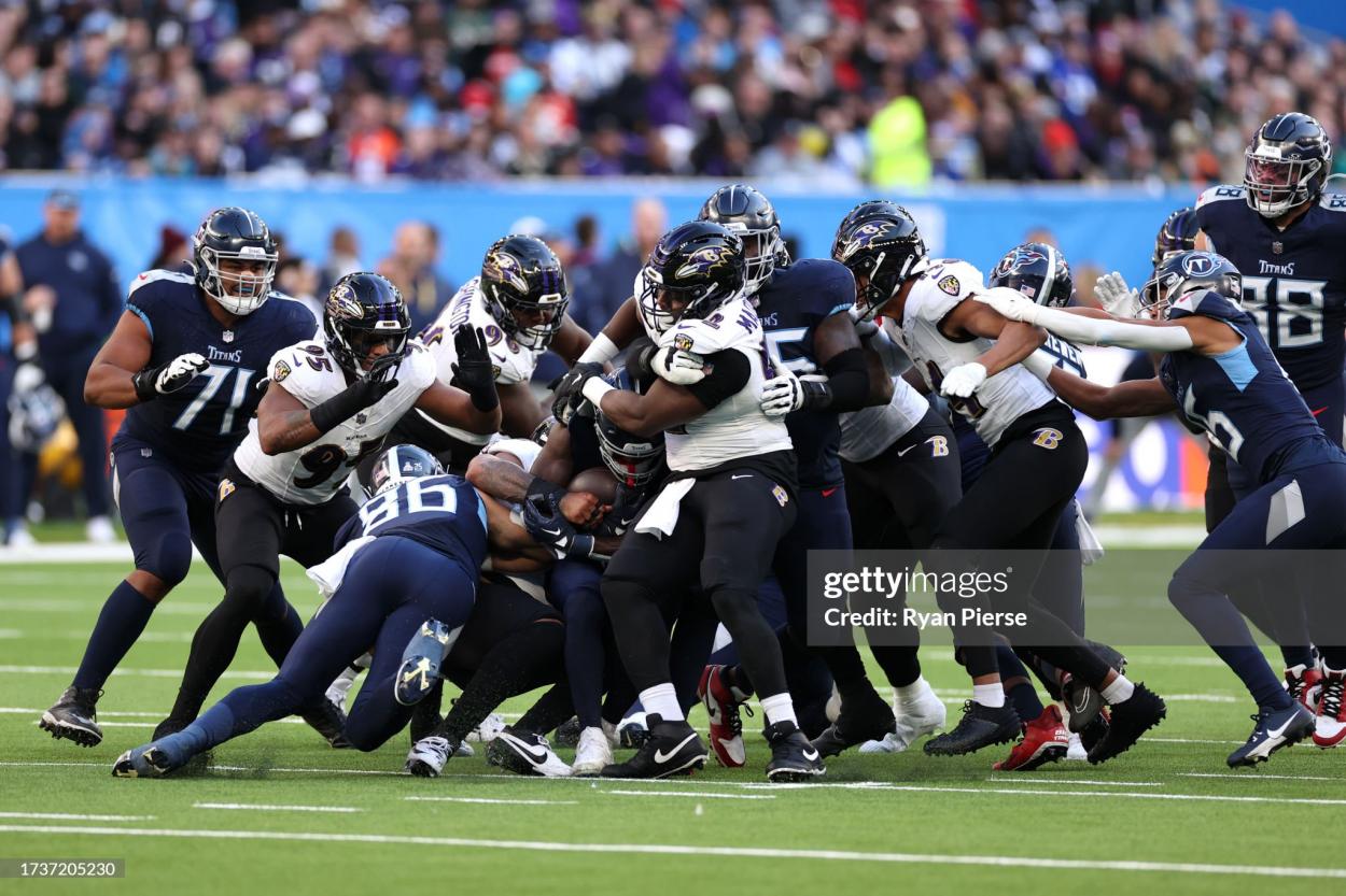 Tyjae Spears #32 of the Tennessee Titans is tackled in the second quarter during the 2023 NFL London Games match between Baltimore Ravens and Tennessee Titans at Tottenham Hotspur Stadium on October 15, 2023 in London, England. (Photo by Ryan Pierse/Getty Images)