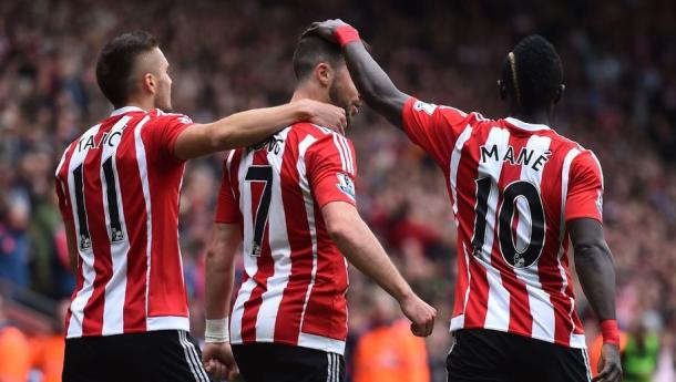 Long (centre) celebrates scoring against Manchester City with Dusan Tadic and Sadio Mane | Photo: 90min.com