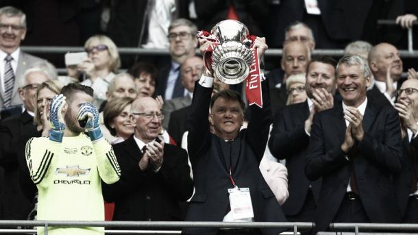 Louis Van Gaal lifts the Emirates FA Cup in his last game as Manchester United manager. Photo: SkySports