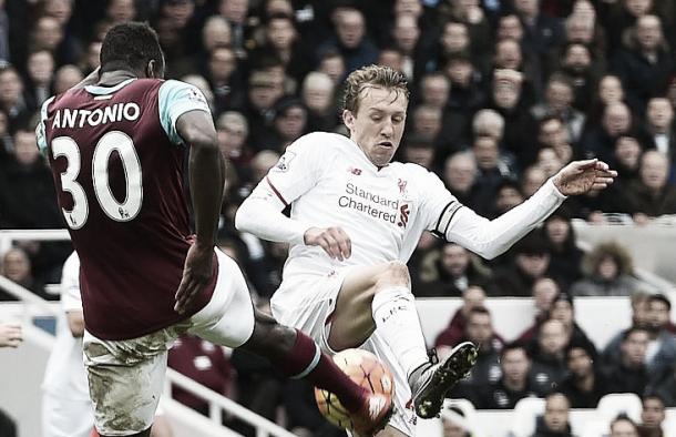 Lucas Leiva battles for possession in a defensive role for Liverpool (image:getty)