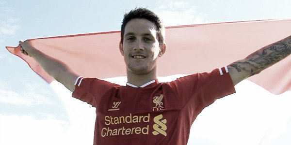 Alberto waves flag proudly after completing move to Liverpool (image: thisisanfield.com)