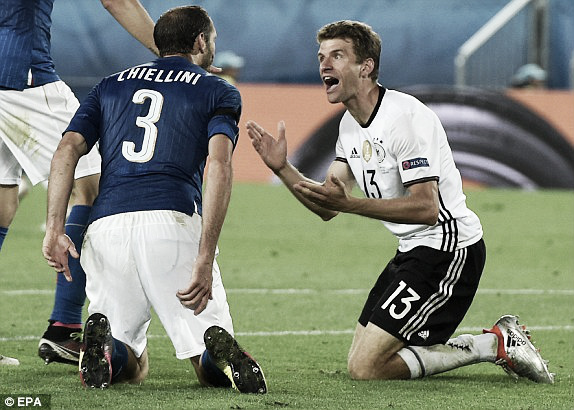 Above: Thomas Muller arguing with Giorgio Chiellini in Germany's win over Italy | Photo: EPA 