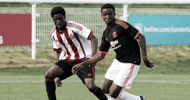 Above: Josh Maja in action agains Manchester United last season | Photo: Manchester United via Getty Images 