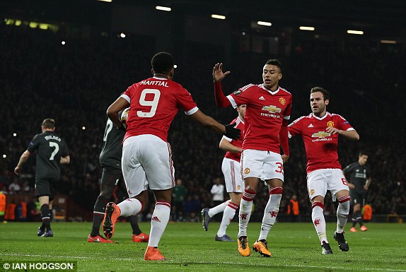 Martial is congratulated after opening the scoring (photo: Ian Hodgson)