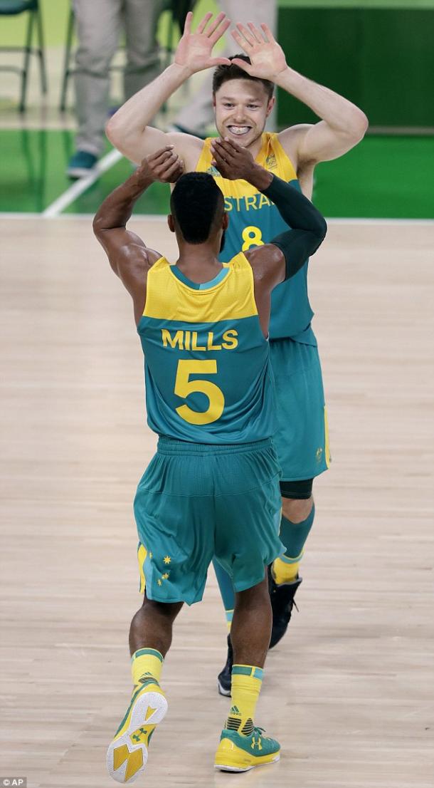 Patty Mills (5) and Matthew Dellavedova (8) have been outstanding for the Boomers. Photo: Associated Press