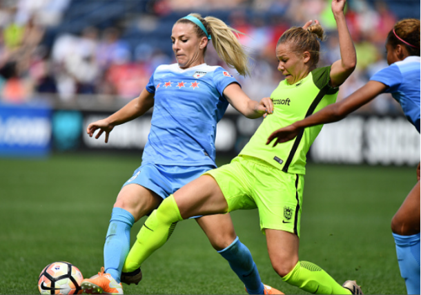 Mathias challenges Chicago Red Stars midfielder Julie Ertz, but commits a foul in the process. | Photo: Quinn Harris - Icon Sportswire via Getty Images