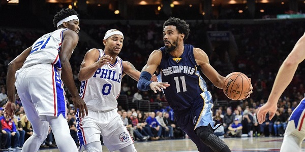 Mike Conley circondato dalla difesa dei 76ers