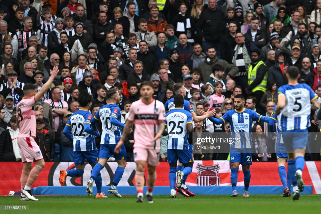 Deniz Undav of Brighton & Hove Albion celebrates with teammates after scoring the team's first goal during the Emirates FA Cup Quarter Final match between Brighton & Hove Albion and Grimsby Town at Amex Stadium on March 19, 2023 in Brighton, England. (Photo by Mike Hewitt/Getty Images)