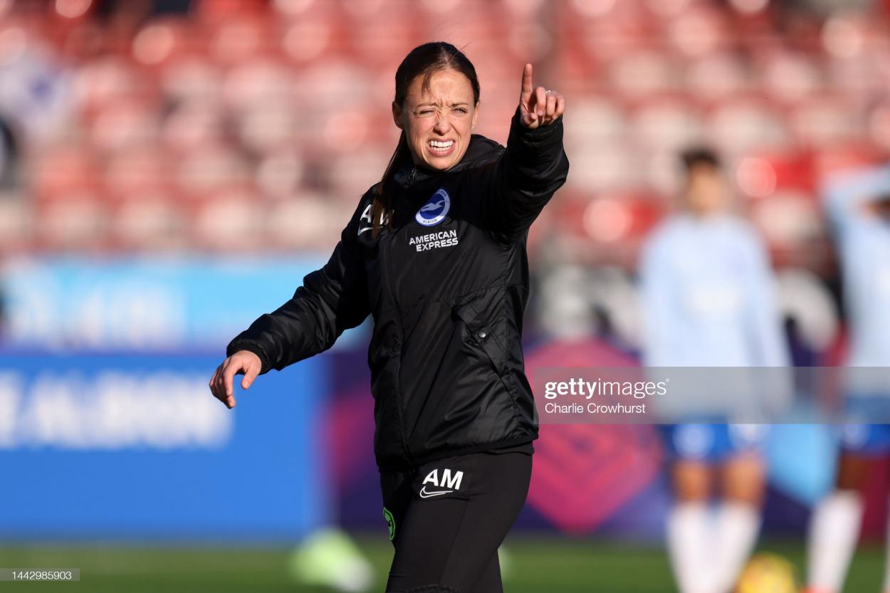 Brighton interim manager Amy Merricks leads the warm up during the FA Women's Super League match between Brighton & Hove Albion and Liverpool at Broadfield Stadium on November 20, 2022 in Crawley, England. (Photo by Charlie Crowhurst/Getty Images)