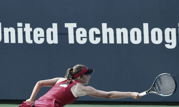 Getty Images: Mertens reaches for Cibulkova's swing volley