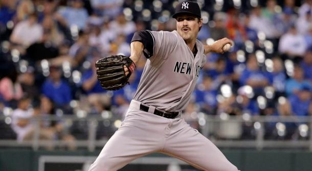 Andrew Miller pitches to the Kansas City Royals.