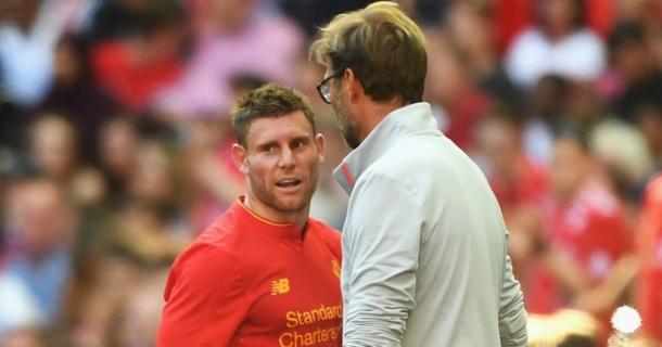 Milner speaks with Klopp after being brought off against Barcelona. (Picture: Getty Images)