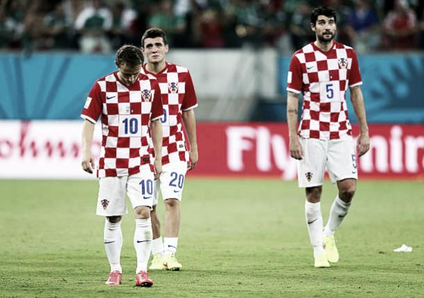 Modric, Kovacic e Corluka desolados após a eliminação para o México em 2014 (Fonte:Getty Images)