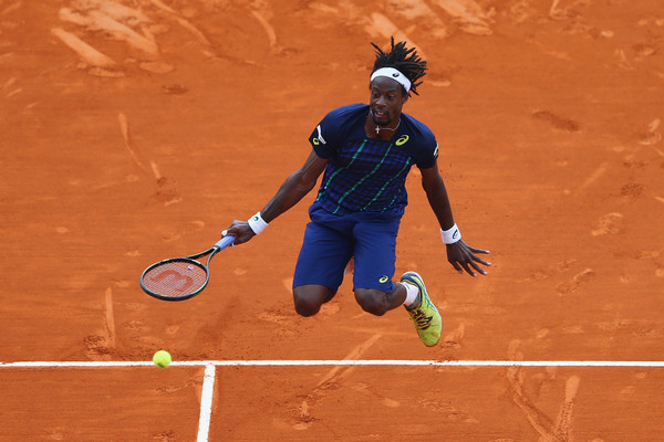 Gael Monfils of France jumps to return the ball during the singles final match against Rafael Nadal of Spain during day eight of the Monte Carlo Rolex Masters. Source: Getty Images