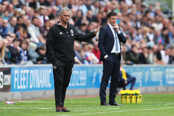 Mourinho on the sideline in the Wigan friendly | Photo: getty images