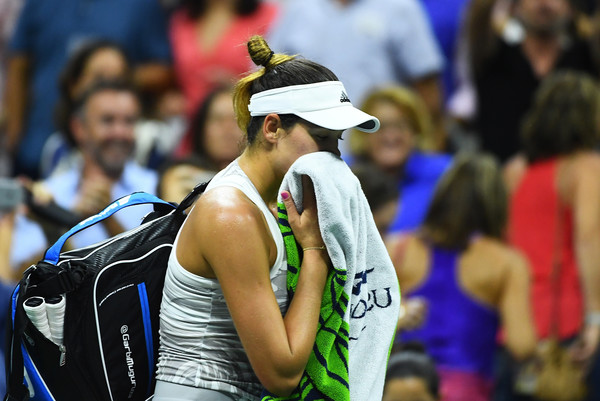 Muguruza leaves the court following a shocking second round loss to Sevastova at the US Open (Photo by Alex Goodlett / Getty Images)