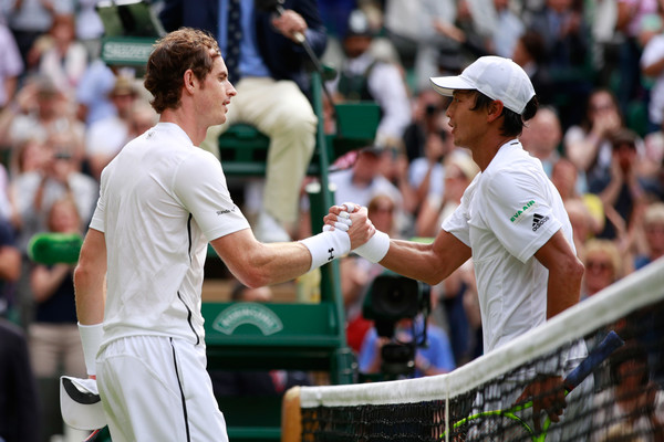 Murray and Lu shake hands following their second round victory at Wimbledon (Photo by Adam Pretty / Source : Getty Images)