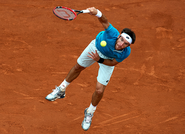 BARCELONA, SPAIN - APRIL 22: Leonardo Mayer of Argentina serves to Pablo Andujar of Spain during day three of the Barcelona Open Banc Sabadell at the Real Club de Tenis Barcelona on April 22, 2015 in Barcelona, Spain. (Photo by Manuel Queimadelos Alonso/Getty Images)